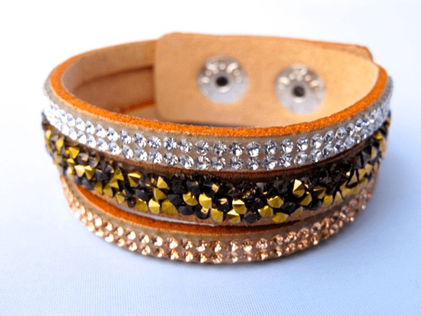 Beige cut leather bracelet with crystals