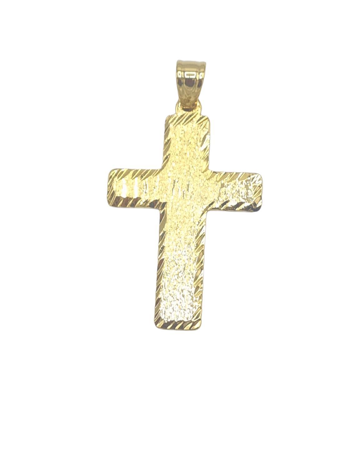 Gold colored cross medallion