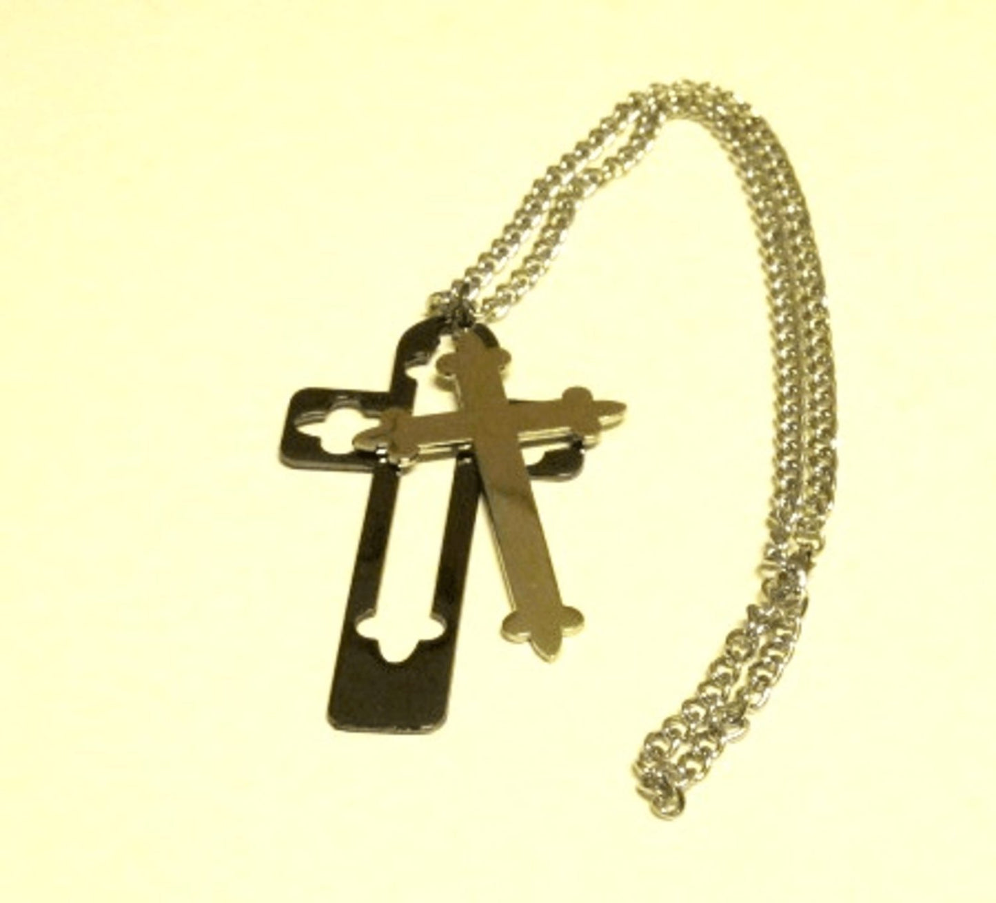 Cross necklace silver and black colored