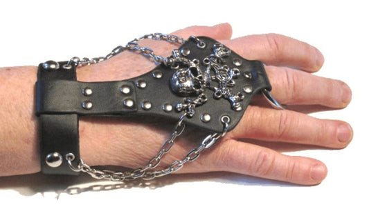 Leather bracelet with skull and round rivets