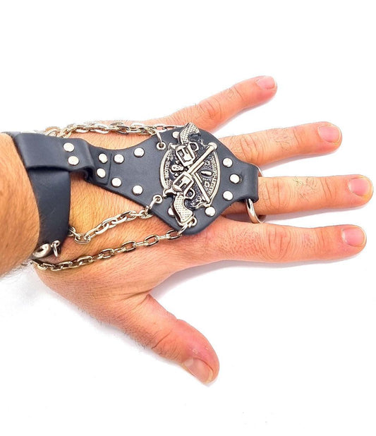 Leather bracelet with pistols, chains and round studs