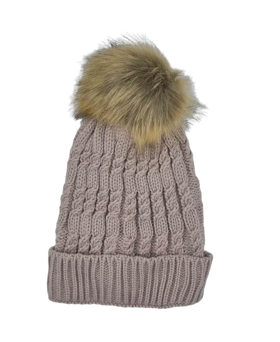 Light brown hat with fur ball