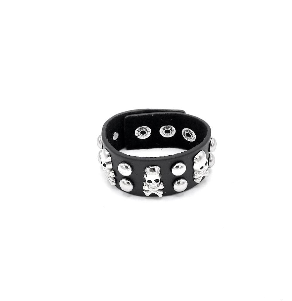 Rivet bracelet with silver colored round rivets and skulls