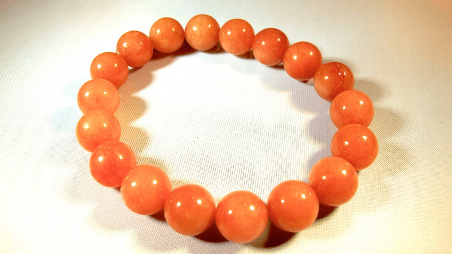 Orange armband i sten