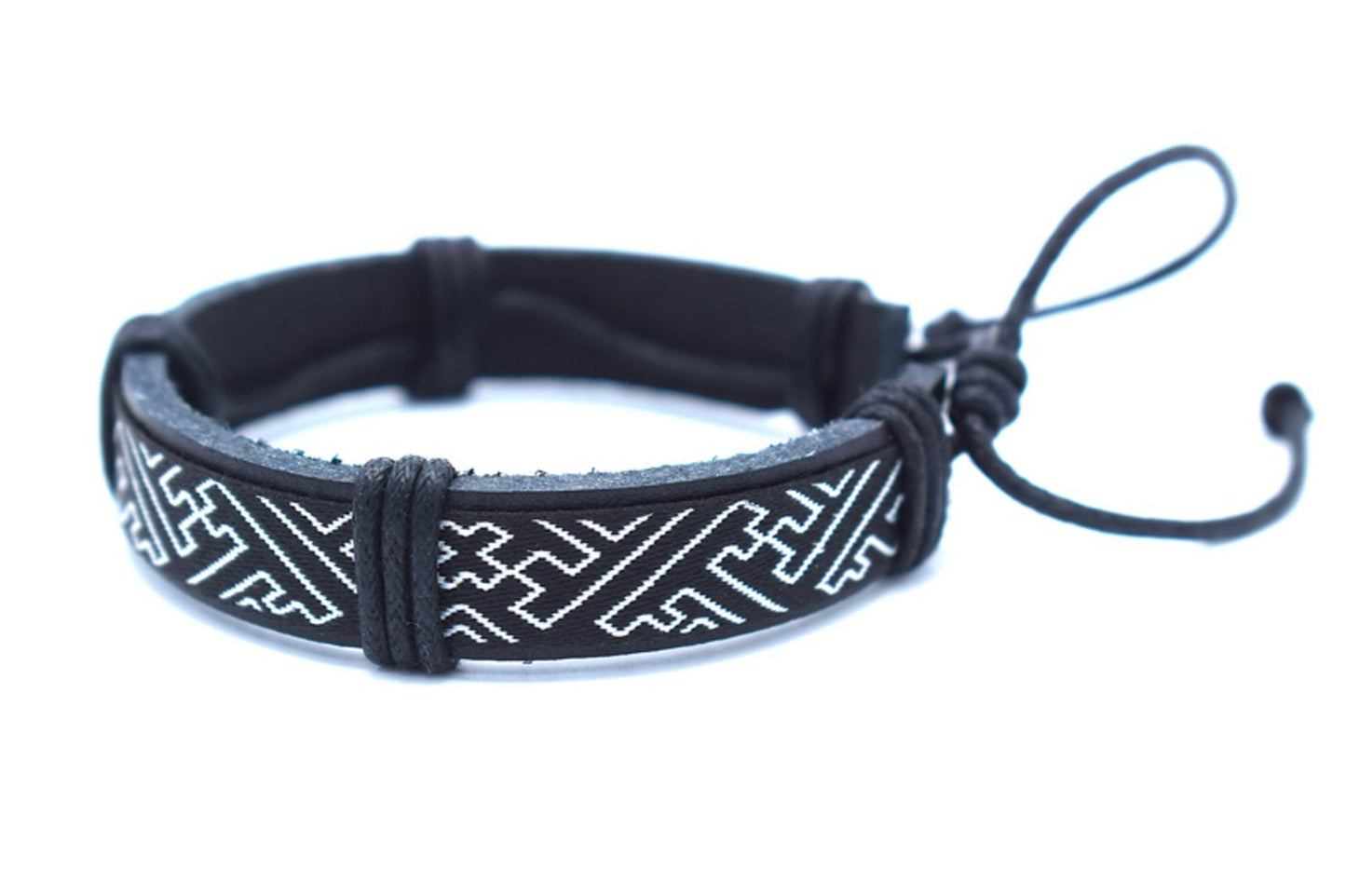 Black leather bracelet with white patterns